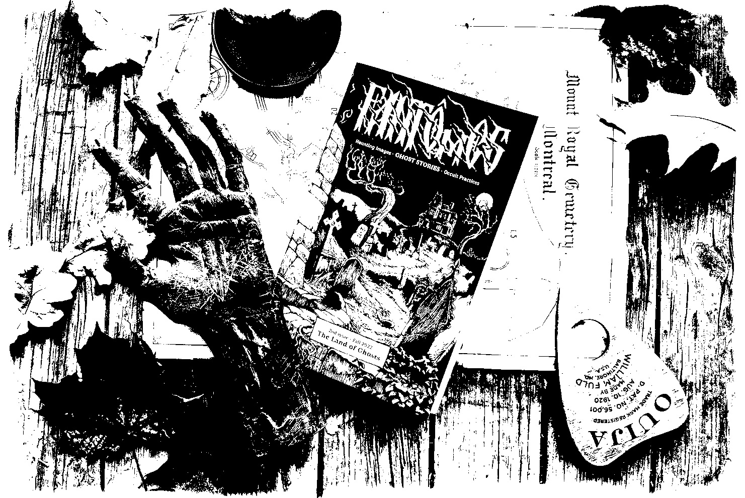 A very grainy photo of the second edition of fantomes zine surrounded by dead leaves, a ouija planchette, and a hand of glory.
